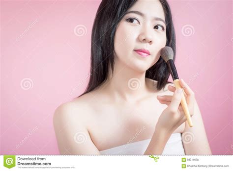 Long Hair Asian Young Beautiful Woman Applying Cosmetic Powder Brush On