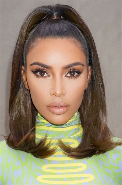 Kim Kardashian Half Up Half Up Hairdo And Winged Liner Eyeliner Makeup