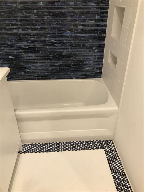 4.4 out of 5 stars 10. Navy penny rounds, glass tile wall, nautical baths ...