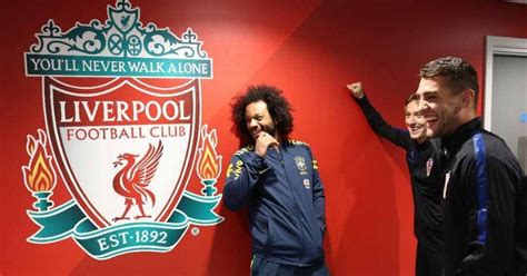 Sitting tall in the centre of the badge. Real Madrid stars accused of mocking Liverpool badge at Anfield - but here's what really ...