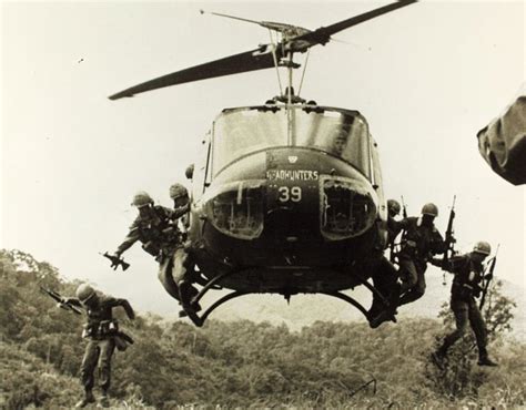 Soldiers Jump From Hovering Huey Vietnam Date Unknown 1242 × 971