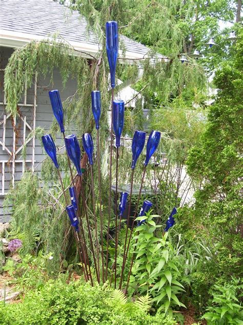 10 mm rebar weighs 0.376 pounds per foot. Bottle tree made with individual stakes. Home Depot sells ...