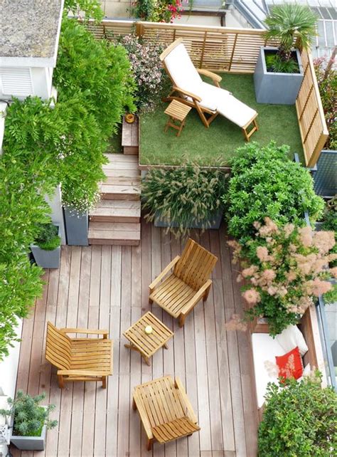 L'aménagement terrasse bois est très chaleureux et convivial. idee deco jardin terrasse - Idée de déco