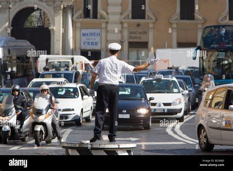 Traffic Policeman Directing Traffic In Rome Italy Stock Photo Alamy