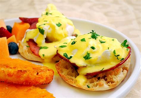With a spoon, make a swirling motion in water and slowly add egg, using spoon to tuck egg white. Eggs Benedict with Foolproof Hollandaise Sauce - What's Cookin, Chicago