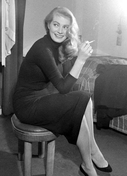 prints of actress anita ekberg seen here during a daily mirror photo shoot in her hotel room