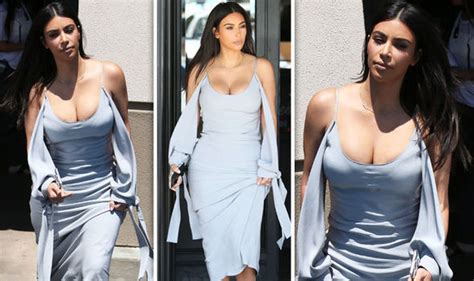 Kim Kardashian Puts On Very Busty Display As She Squeezes