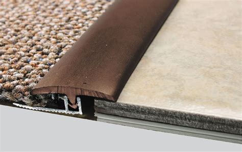 I've been kicking around replacing my first floor with vinyl planks also think about your transitions between rooms and hallways my halls were carbonized tiger bamboo and was. Guide to Floor Transition Strips
