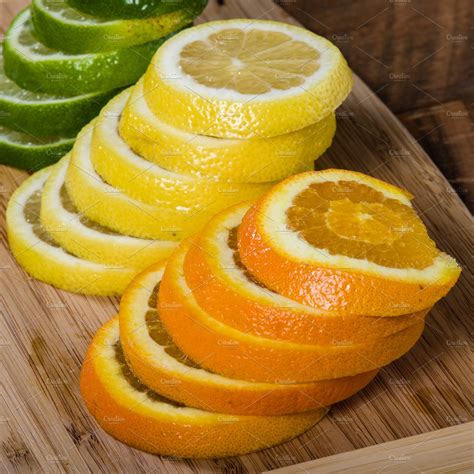 Citrus Fruit Slices Stacked High Quality Food Images ~ Creative Market