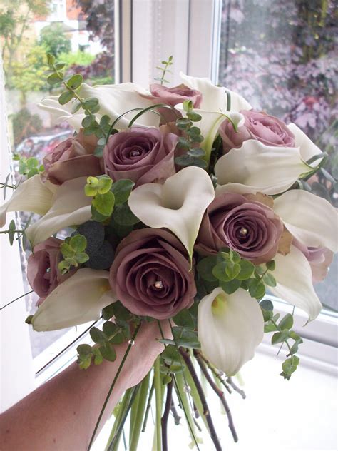 We love this mixed bouquet of white peonies, peach garden roses, and sculptural succulents for a springtime desert wedding in palm springs. FLORIAN Designer Florist & Wedding Flower Specialist: June ...