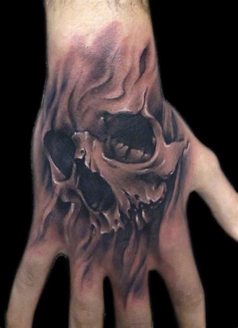 50 Skull Hand Tattoo Designs With Meaning Art And Design