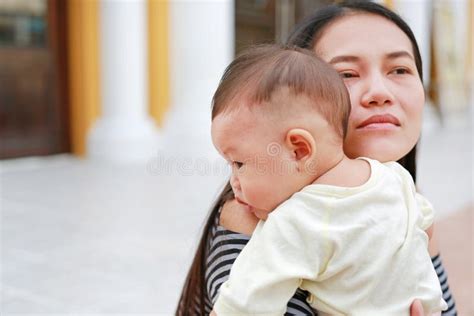 Asian Mother Carrying Her Infant Close Up Stock Photo Image Of
