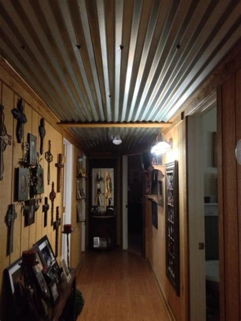 The american tin ceiling company is the leading manufacturer of tin ceiling tiles in the world. Barn tin ceiling in our hallway | For the Home | Pinterest ...