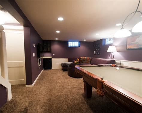 The wet bar is perfectly positioned under the stairway leading to the main floor. Narrow Basement Home Design Ideas, Pictures, Remodel and Decor