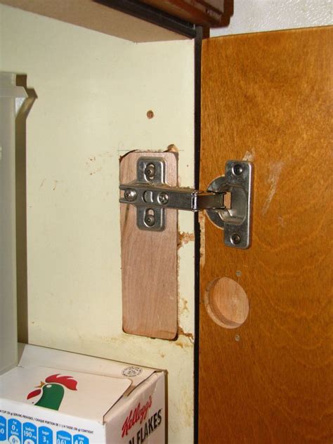 Remove one loose hinge screw. Repair Cabinet Door Hinge | online information