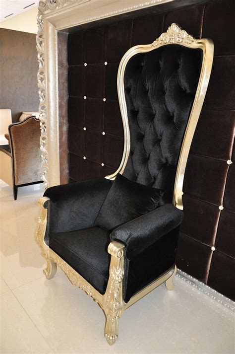 Rose's on a silver chair. Baroque throne chair upholstered in beautiful plush black ...