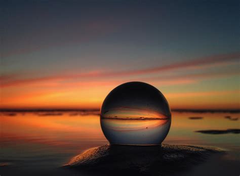 Glass Ball Refracting The Sunset During High Tide Oc Rpics