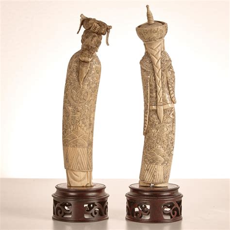 A Pair Of Chinese Ivory Figures Of Emperor And Empress