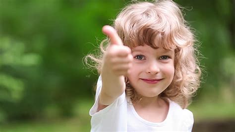 Happy Child Showing Thumbs Up By Sunnystudio Videohive