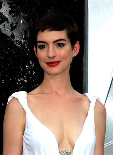 Anne Hathaway Showing Cleavage In White Dress At Dark Knight Rises