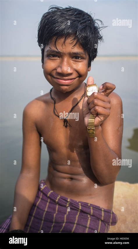 Varanasi India February Indian Boy Sits Shirtless On Rock