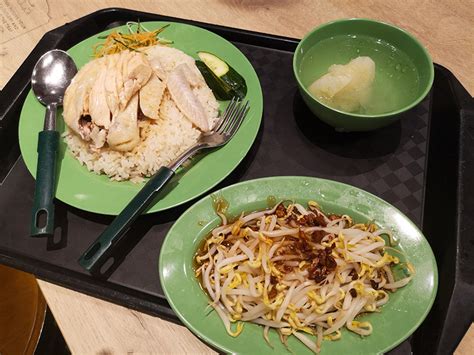 While the rice is cooking, carve the chicken for serving. Reiseblog Christine Liew, Hainan Chicken Rice ...