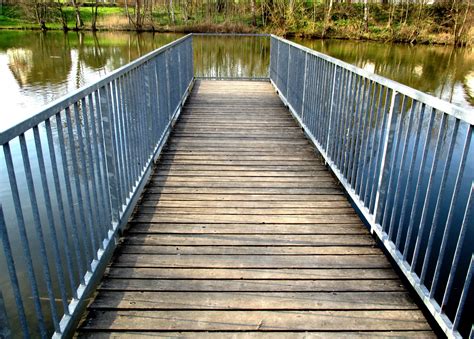 Typical railing height is 42 to 48 inches; Free Images : water, boardwalk, walkway, suspension bridge ...