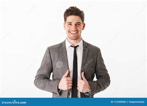 Pleased Business Man Holding Jacket And Looking At The Camera Stock