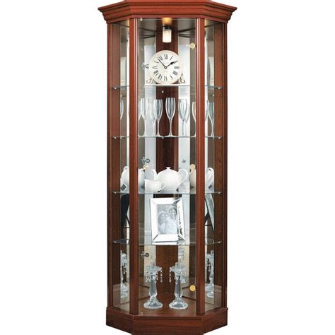 A short curio cabinet display case looks great in any room with a wall mirror above it. Buy HOME Corner Glass Display Cabinet - Mahogany Effect at ...
