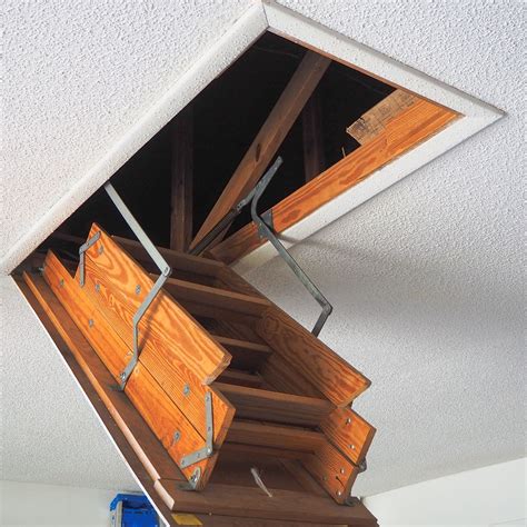 Garage Stairs To Attic How To Install An Attic Ladder How Tos Diy