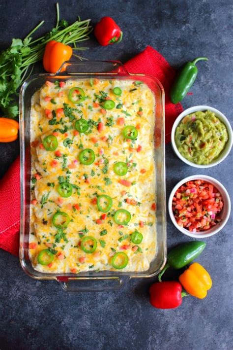 Cover with a thick layer of cheese. Sour Cream Shredded Chicken Enchiladas - Delightful E Made