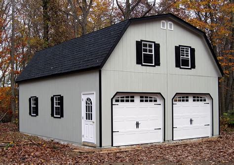 Traditional home series (56 sample plans). 24x30 2-car garage with gambrel (barn-style) roof. Built ...