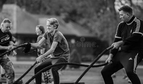 Grayscale Photography Of Two Men Using Exercise Ropes Picture Image