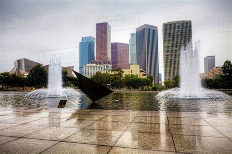 Los Angeles City Center With Reflecting Pool In The Foreground Stock