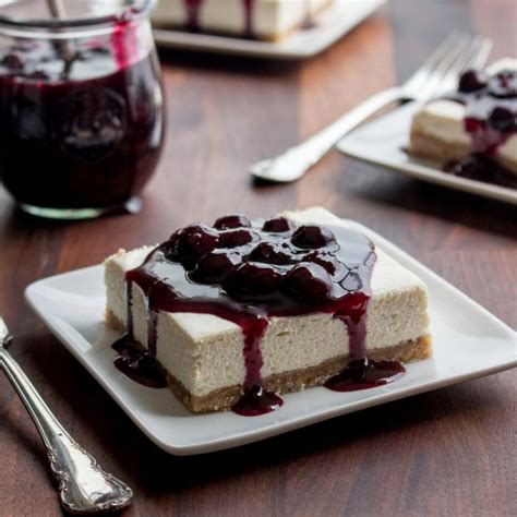 A variety of flavors, including fudge brownie, lemon, and carrot cake with two layers of new york style cheesecake with boston cream filling and chocolate ganache topping. No-bake Cheesecake Bars (Blueberry Sauce) | Low Carb Maven