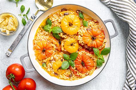 That means gimme the couscous, nuts. Mediterranean Couscous Stuffed Tomatoes with Feta and ...