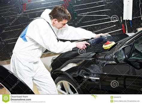 Mechanic Repairing And Polishing Car Headlight Stock Image Image Of