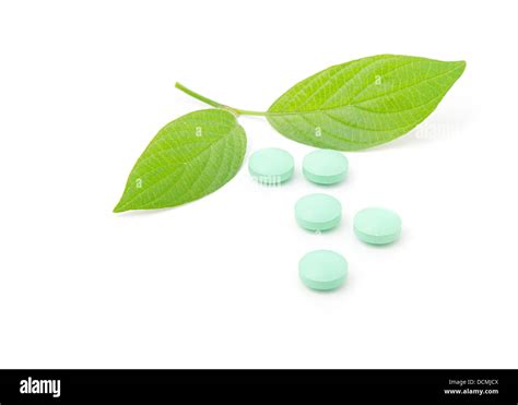 Pills With Green Leaf Isolated On A White Background Herbal Medicine