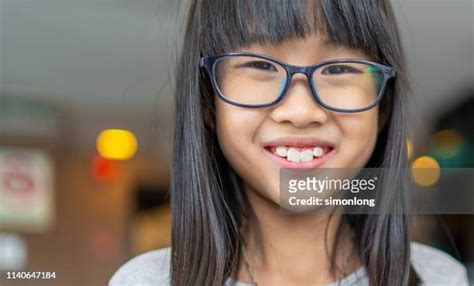 asian girls with glasses photos and premium high res pictures getty images