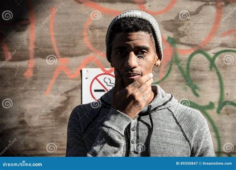 A Young Black Hipster Poses For A Candid Photograph In Nyc Stock Image