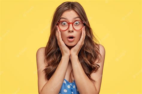 Free Photo Indoor Shot Of Astonished Young Woman With Glasses Posing