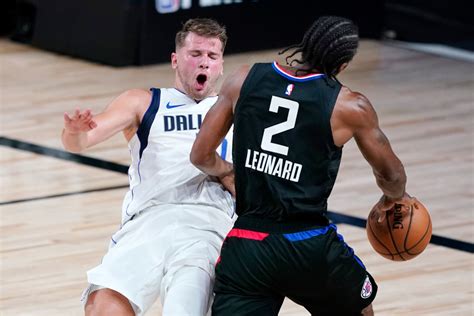 Clippers attacking porizingis in pick and roll. Photos: Clippers vs. Dallas Mavericks in Game 2 of NBA playoff series - Press Telegram