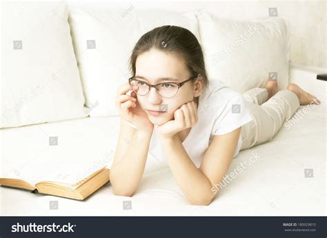 Teen Girl Glasses Reading Book Lying Stock Photo 180929810 Shutterstock