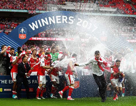 Arsene Wenger Arsenal Manager Lifts Fa Cup As Players Enjoy Wild