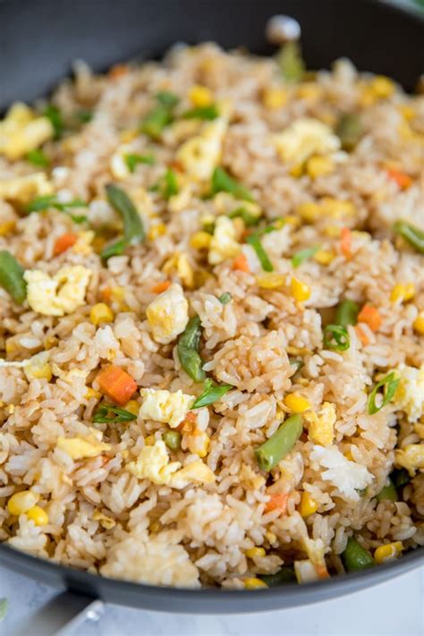 Ingredients 2 tablespoons vegetable oil 1/4 cup onion (finely chopped) 3 cloves garlic (minced) Easy Egg Fried Rice Recipe | YellowBlissRoad.com