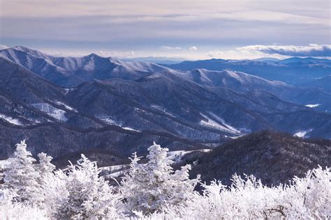 A Sweeping View Of The Snow Covered Blue Ridge Mountains From The Round
