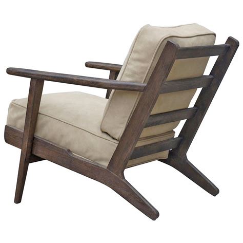 Retro modern design is celebrated in thisretro modern design is celebrated in this streamlined arm chair softened with antique brown bicast leather. Rider Mid Century Modern Oak Nubuck Camel Suede Leather ...