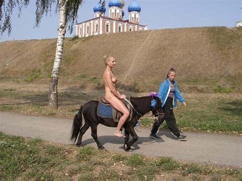 Nude pony riding