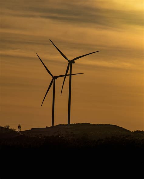 Wind Turbines On Hill During Sunset · Free Stock Photo