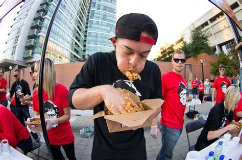 World Poutine Eating Champ Defends Crown In Toronto